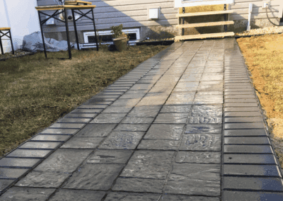 Garden walkway with Belgard pavers designed by PaleroGreenscaper